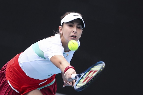 epa09690162 Belinda Bencic of Switzerland in action against Kristina Mladenovic of France during the first round match at the Australian Open Grand Slam tennis tournament in Melbourne, Australia, 17 J ...