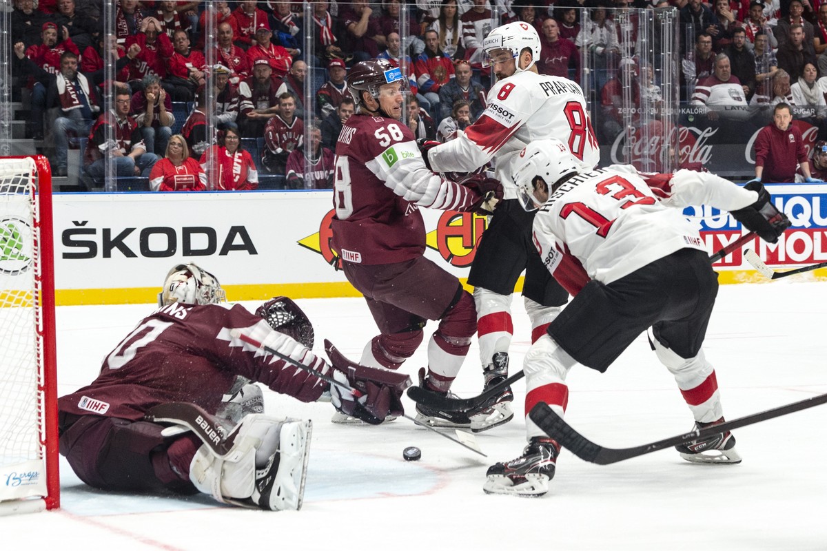 Switzerland's Nico Hischier scores the 2:1 against Lativa`s Elvis Merzlikins during the game between Latvia and Switzerland, at the IIHF 2019 World Ice Hockey Championships, at the Ondrej Nepela  ...