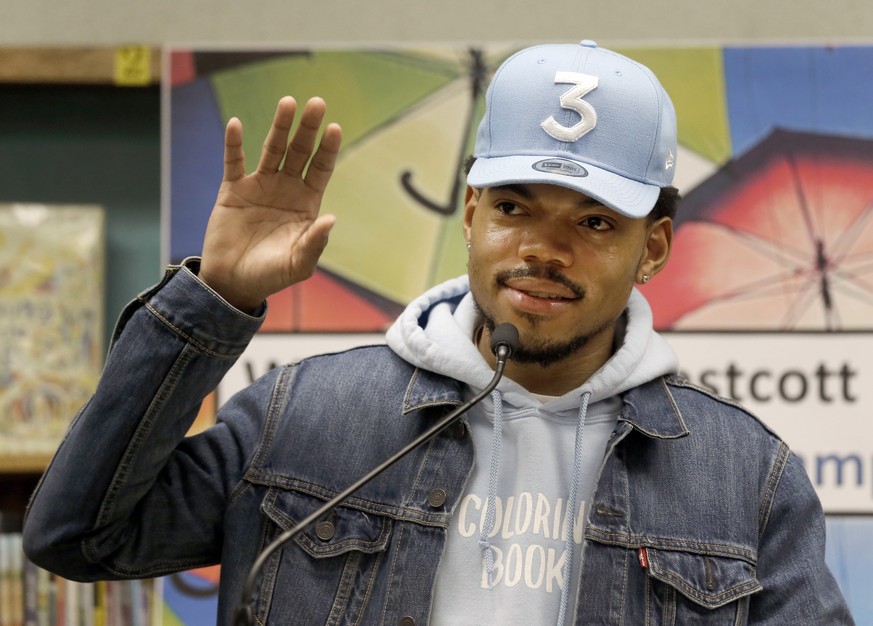 Chance The Rapper announces a gift of $1 million to the Chicago Public School Foundation during a news conference at the Westcott Elementary School, Monday, March 6, 2017, in Chicago. The Grammy-winni ...