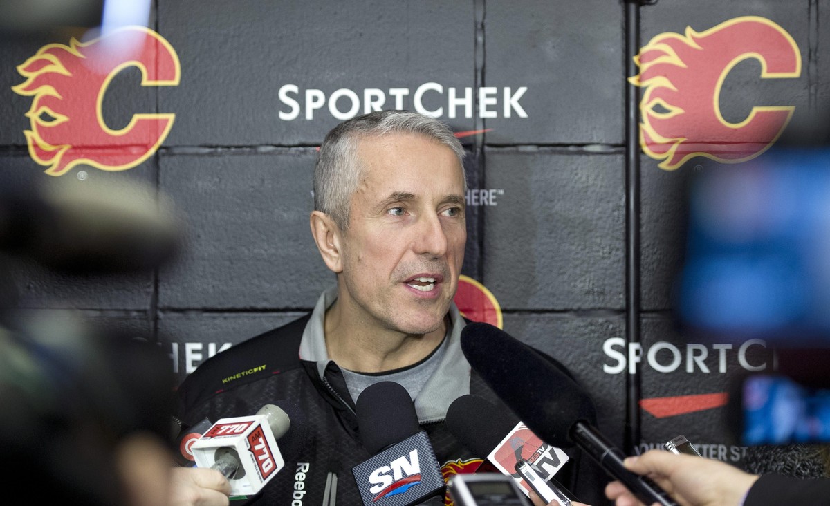 Calgary Flames' head coach Bob Hartley speaks to the media as team members show up for season-end activities in Calgary,on Monday, April 14, 2014. Flames ended the season 27th in the NHL standing ...