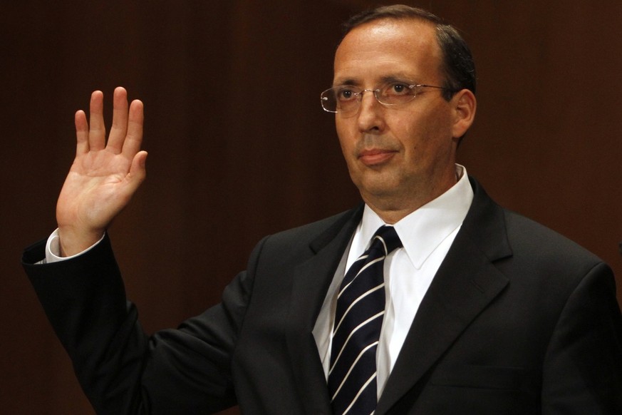 Former AIG CEO Joseph Cassano is sworn in on Capitol Hill in Washington, Wednesday, June 30, 2010, prior to before testifying before the Financial Crisis Inquiry Commission. (AP Photo/Jacquelyn Martin ...