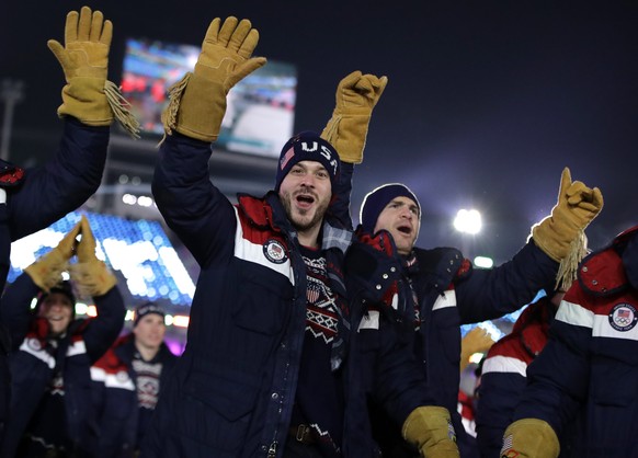 Members of the United States team wave during the opening ceremony of the 2018 Winter Olympics in Pyeongchang, South Korea, Friday, Feb. 9, 2018. (AP Photo/Vadim Ghirda)
