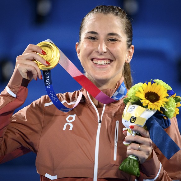 Gold medal winner Belinda Bencic of Switzerland celebrates with her medal during the victory ceremony after winning the games against Marketa Vondrousova of Czech Republic during the women's sing ...