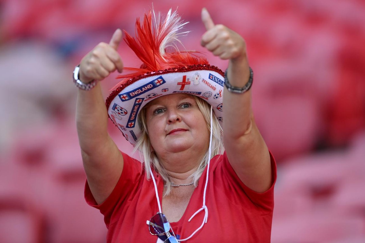 An England supporter gives the thumb-up sign prior to the Euro 2020 soccer championship group D match between England and Croatia, at Wembley stadium, London, Sunday, June 13, 2021. (Laurence Griffith ...