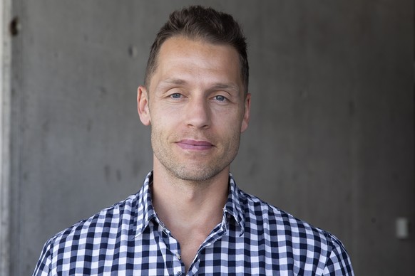 Marc Gautschi, Sport Director of Geneve-Servette HC, respecting the social distance as a precaution against the spread of the coronavirus COVID-19 poses for the photographer, after the first training  ...