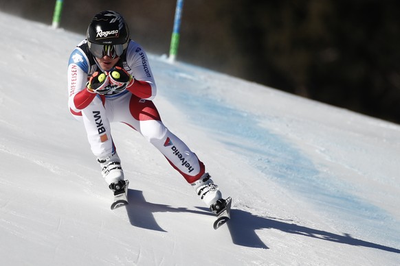 Switzerland&#039;s Lara Gut Behrami speeds down the course of an alpine ski, women&#039;s World Cup super-G race in Cortina d&#039;Ampezzo, Italy, Sunday, Jan. 23, 2022. (AP Photo/Gabriele Facciotti)