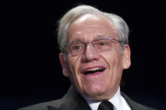 FILE - In this April 29, 2017, file photo journalist Bob Woodward sits at the head table during the White House Correspondents&#039; Dinner in Washington. (AP Photo/Cliff Owen, File)