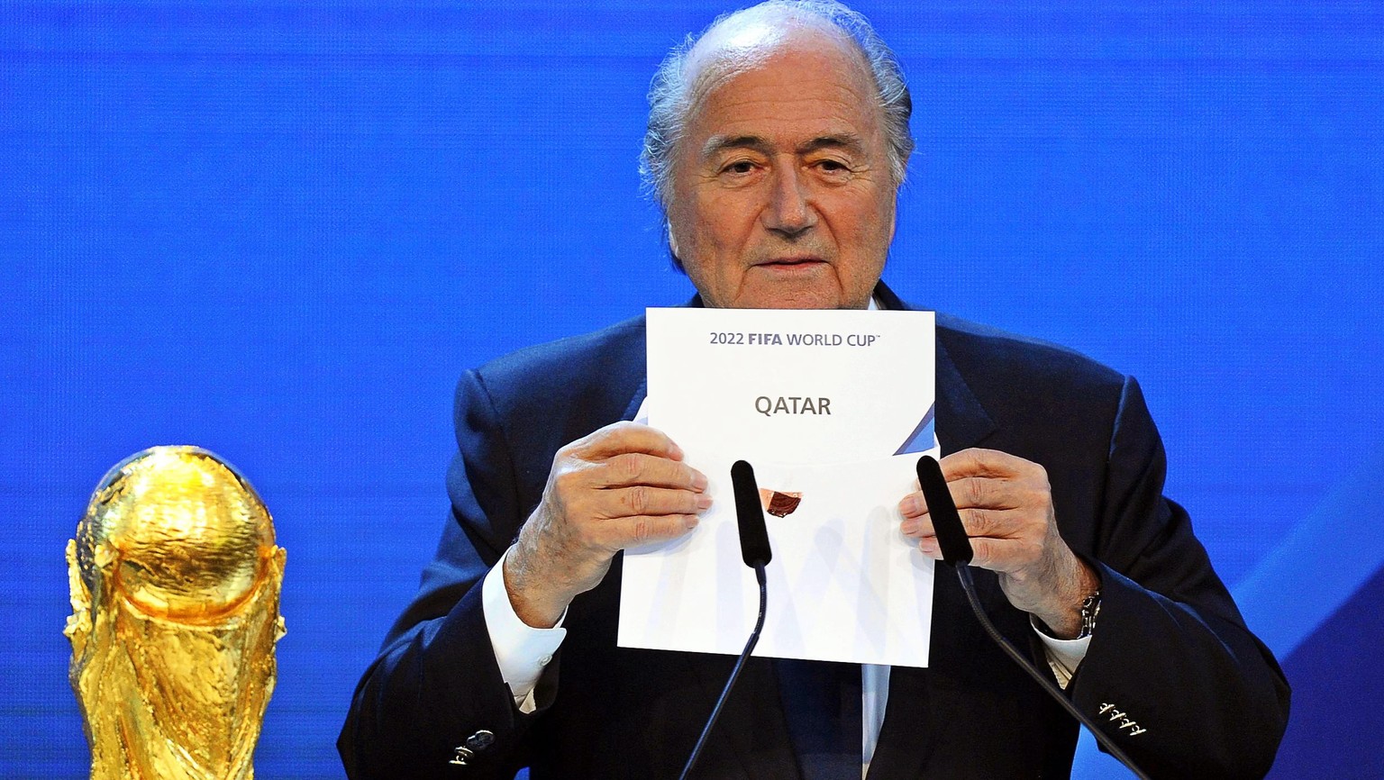 epa04634776 (FILE) A file picture dated 02 December 2010 of FIFA President Joseph Blatter announcing that Qatar will be hosting the 2022 Soccer World Cup during the FIFA 2018 and 2022 World Cup Bid An ...