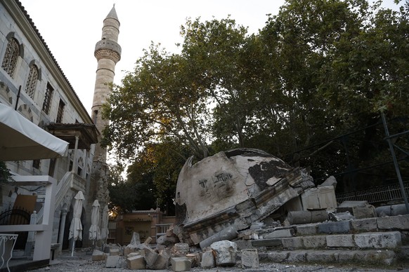 epa06102431 A damaged part of a minaret is seen fallen following an earthquake on the island of Kos, Greece, 21 July 2017. Two earthquake-related fatalities were reported on the island of Kos in the e ...