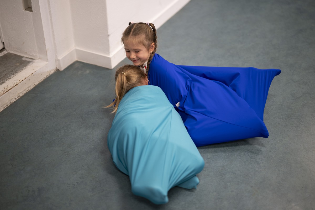 Kinder aus der Ukraine spielen in der Therapie im Red Cross Summer Camp, am Montag, 31. August 2026, in St. Gallen. Das Schweizerische Rote Kreuz bietet Kindern und ihren Begleitpersonen, die besonder ...