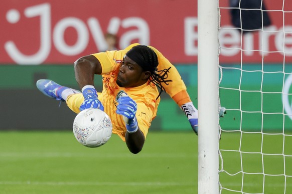 St. Gallen&#039;s goalkeeper Lawrence Ati Zigi in action during the UEFA Conference League playoff soccer match between FC St. Gallen and Trabzonspor at the Kybunpark stadium in St. Gallen, Switzerlan ...