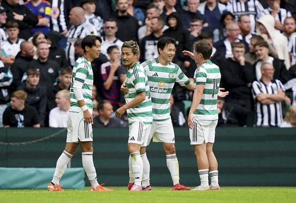 Celtic&#039;s Yang Hyun-Jun (second right) celebrates after scoring his side&#039;s third goal during the pre-season friendly match between Celtic and Newcastle United at Celtic Park, Glasgow, Saturda ...