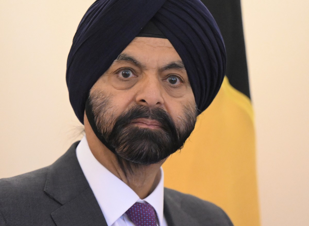 epa11594087 President of the World Bank Group Ajay Banga reacts ahead of a meeting with the Australian prime minister at Parliament House in Canberra, Australia, 09 September 2024. EPA/LUKAS COCH AUST ...