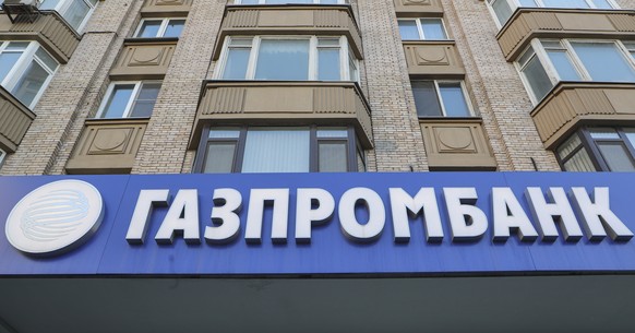 epa09784244 A logo of the Russian bank GazpromBank een on the headquarters in Moscow, Russia, 25 February 2022. In response to the military operation of the Russian armed forces that began in Ukraine, ...