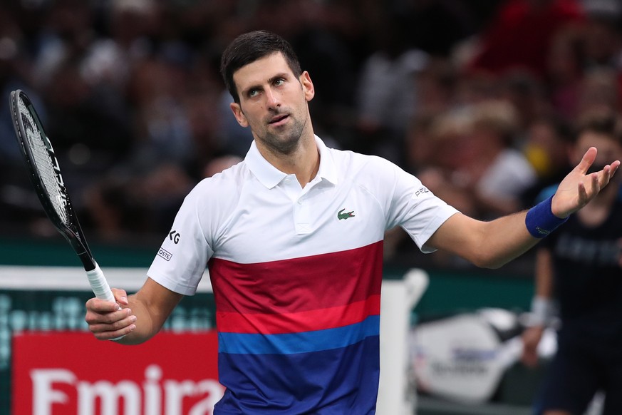 epa09570027 Novak Djokovic of Serbia reacts during the final match against Daniil Medvedev of Russia at the Rolex Paris Masters tennis tournament in Paris, France, 07 November 2021. EPA/CHRISTOPHE PET ...