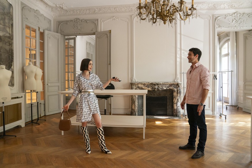 Emily In Paris. (L to R) Lily Collins as Emily, Eugenio Franceschini as Marcello in episode 509 of Emily In Paris. Cr. Caroline Dubois/Netflix © 2025