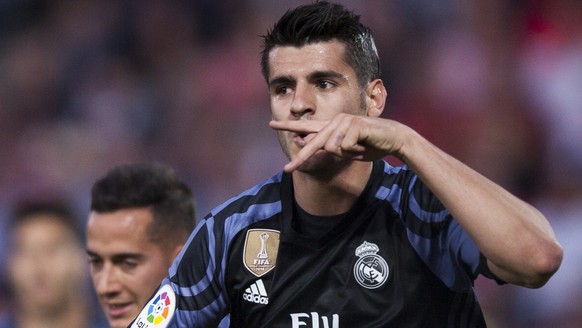 Real Madrid&#039;s Alvaro Morata celebrates scoring his goal against Granada during a Spanish La Liga soccer match between Granada and Real Madrid in Granada, Spain, Saturday May 6, 2017. (AP Photo/Da ...