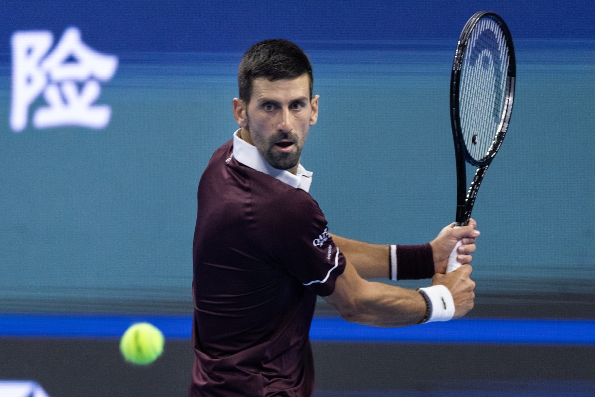 epa13283016 Novak Djokovic of Serbia in action against Daniil Medvedev of Russia during their mens semi-final singles match at the China Open tennis tournament in Beijing, China, 05 October 2026. EPA ...