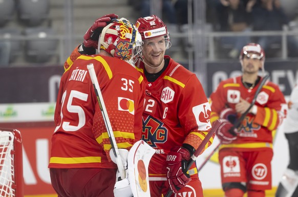 Biel?s goalkeeper Harri Saeteri, left, and Biel?s Gaetan Haas, right, celebrate the victory 3-1 during the Champions Hockey League match between Switzerland&#039;s EHC Biel-Bienne and Slovakia?s HC Ko ...