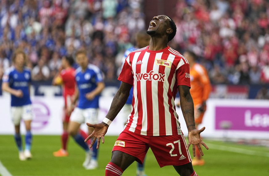 Union&#039;s scorer Sheraldo Becker shouts out during the German Bundesliga soccer match between FC Schalke 04 and Union Berlin in Gelsenkirchen, Germany, Saturday, Aug. 27, 2022. (AP Photo/Martin Mei ...