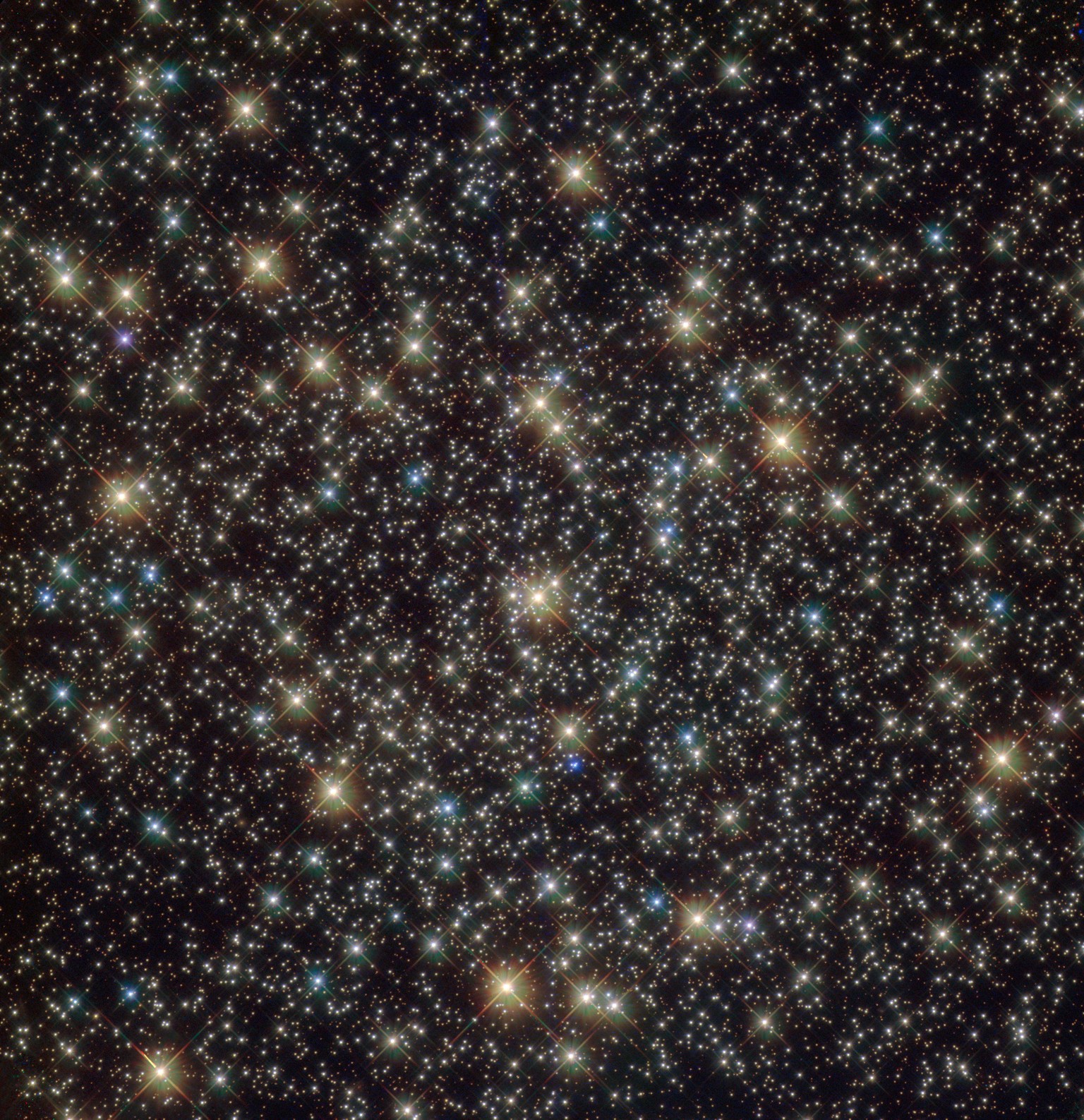 This image from the NASA/ESA Hubble Space Telescope reveals a glistening and ancient globular cluster named NGC 3201 — a gathering of hundreds of thousands of stars bound together by gravity. NGC 3201 ...