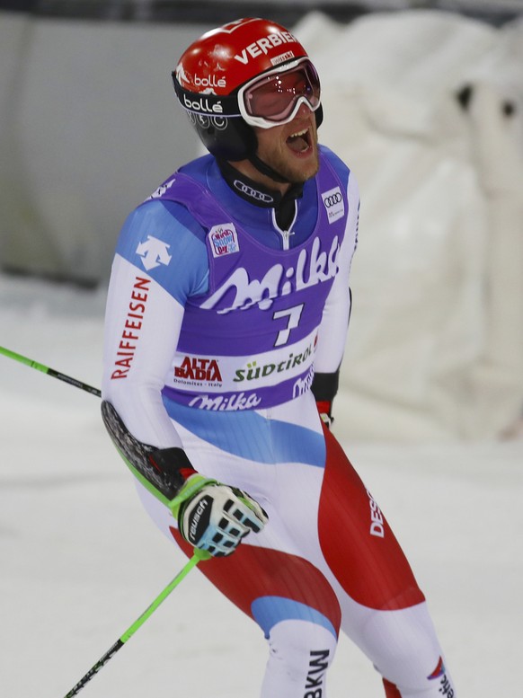 Switzerland&#039;s Justin Murisier reacts in the finish area after completing an alpine ski, men&#039;s World Cup parallel giant slalom in Alta Badia, Italy, Monday, Dec. 18, 2017. (AP Photo/Marco Tro ...