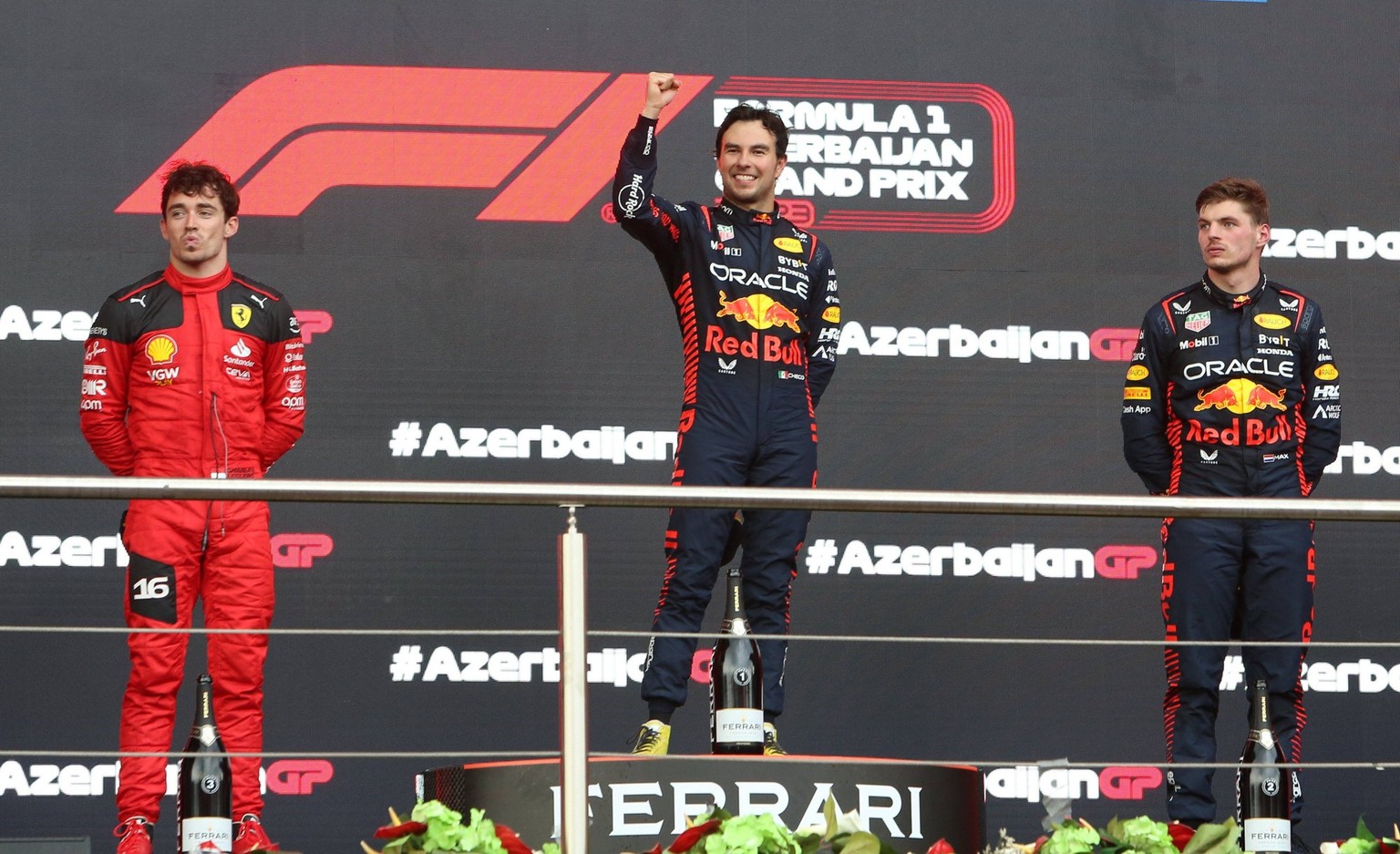230501 -- BAKU, May 1, 2023 -- First placed Red Bull Racing s Mexican driver Sergio Perez C, second placed Red Bull Racing s Dutch driver Max Verstappen R and third placed Ferrari s Monegasque driver  ...