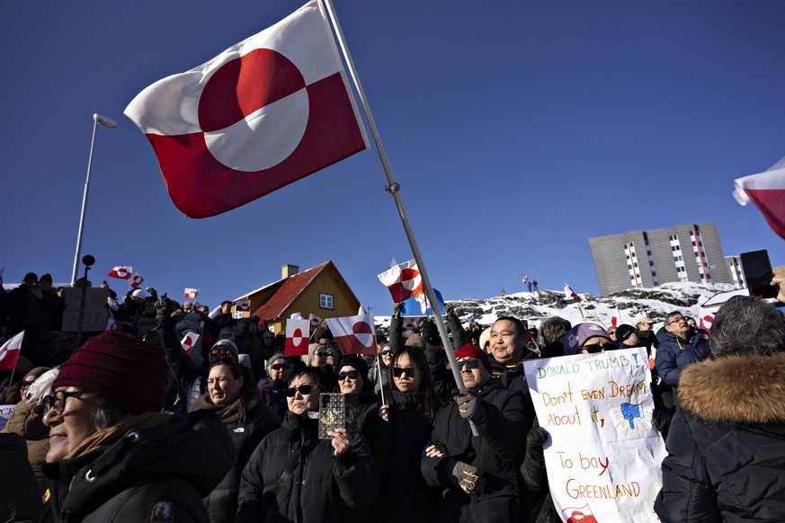 epa11966403 People take part in a demonstration in front of the US consulate in Nuuk, Greenland, on 15 March 2025, under the slogan &#039;Greenland belongs to the Greenlandic people&#039;. EPA/CHRISTI ...