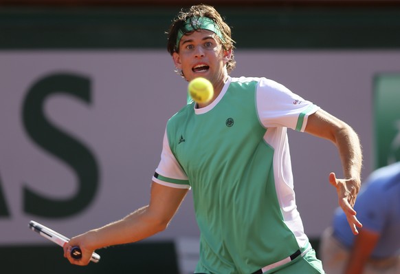 Austria&#039;s Dominic Thiem returns the ball to Spain&#039;s Rafael Nadal during their semifinal match of the French Open tennis tournament at the Roland Garros stadium, Friday, June 9, 2017 in Paris ...