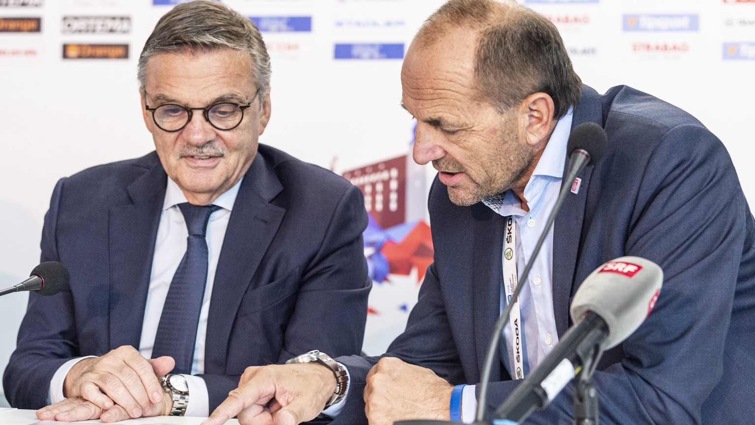 IIHF President Rene Fasel and Gian Gilli, General Secretary IIFH 2020, from left, during the press conference at the IIHF 2019 World Ice Hockey Championships, at the Ondrej Nepela Arena in Bratislava, ...