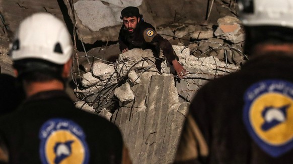 epa06903802 (FILE) - Volunteers of White Helmets search for survivors after an explosion in the city of Idlib, Syria, 09 April 2018, (reissued 22 July 2018). Media reports on 22 July 2018 state that a ...