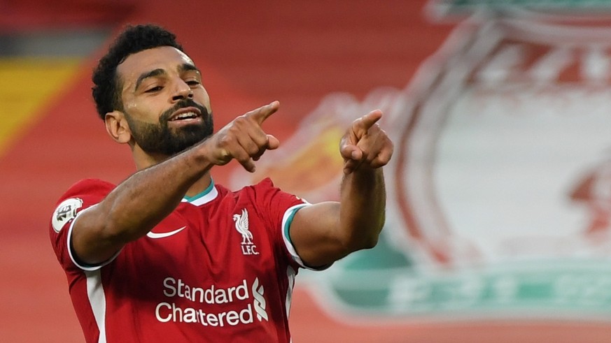 epa08665052 Liverpool&#039;s Mohamed Salah celebrates after scoring the 4-3 goal during the English Premier League soccer match between Liverpool and Leeds United in Liverpool, Britain, 12 September 2 ...