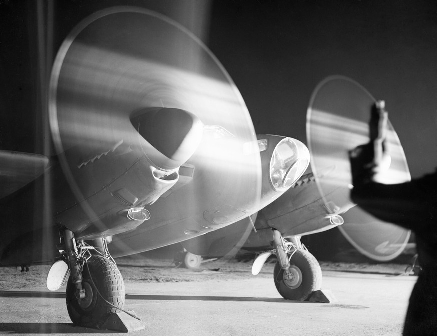 A de Havilland Mosquito PR Mk XVI of No. 140 Squadron RAF warms up its engines at Melsbroek in Belgium, before taking off on a night photographic reconnaissance sortie, 15 February 1945.
A De Havillan ...