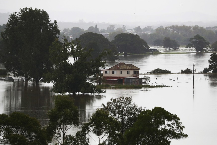 epa09089330 Floodwaters are seen near Kempsey , Northern NSW, Australia, 22 March 2021. Thousands of people have been evacuated on the NSW Mid-North Coast and western Sydney, as swollen rivers flood t ...