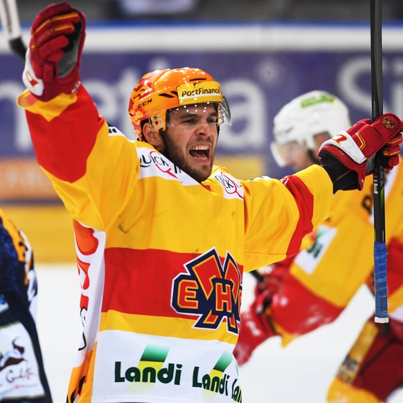 Bienne&#039;s player Marc-Antoine Pouliot celebrates the 2-2 goal, during the preliminary round game of National League Swiss Championship 2017/18 between HC Ambri Piotta and EHC Biel, at the ice stad ...