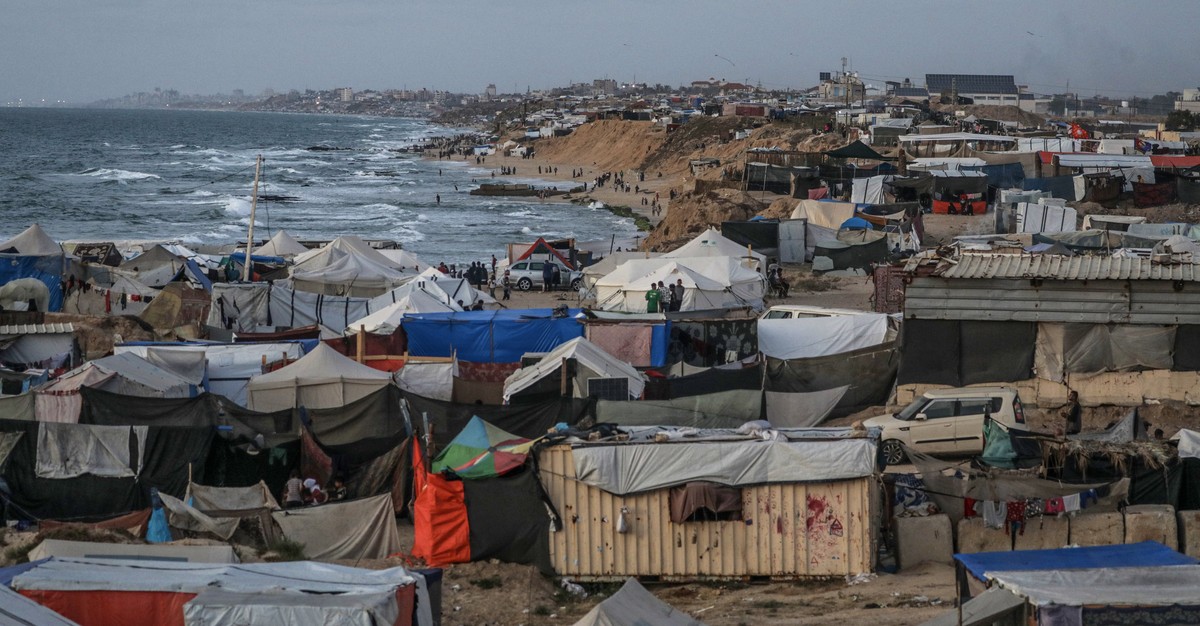 epa11343844 Makeshift shelters at a new camp for internally displaced Palestinians, after the Israeli army asked them to evacuate the city of Rafah, west of Khan Yunis, southern Gaza Strip, 15 May 202 ...