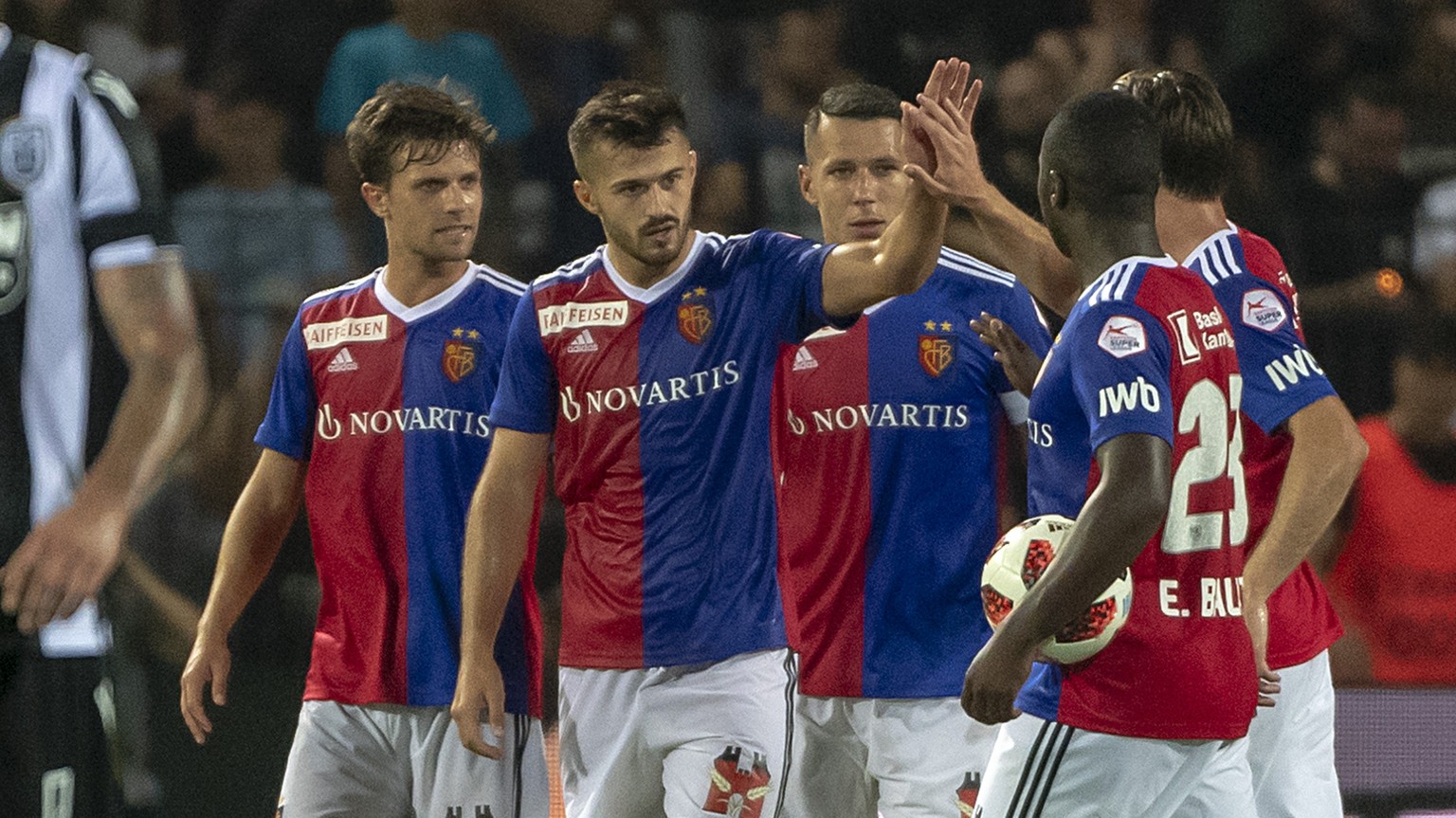 FC Basel&#039;s players cheer after scoring during the UEFA Champions League second qualifying round first leg match between Greece&#039;s PAOK FC and Switzerland&#039;s FC Basel 1893 in the Toumba st ...