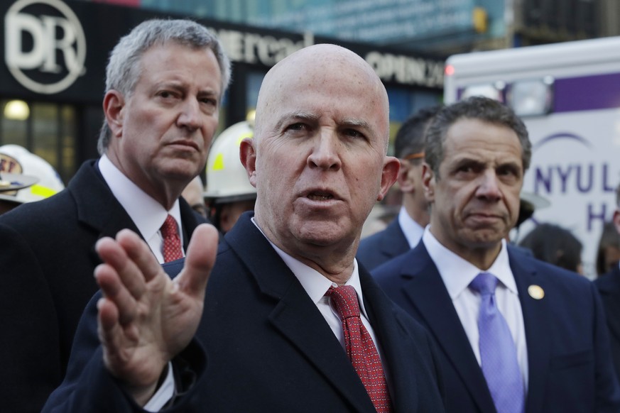 New York City Police Commissioner James O&#039;Neill holds a news conference outside the Port Authority Bus Terminal with Mayor Bill de Blasio, left, and Gov. Andrew Cuomo, Monday, Dec. 11, 2017, in N ...