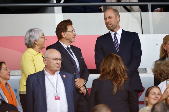 Swiss Federal Councillor Elisabeth Baume-Schneider, Martin Kallen, UEFA Events CEO, and Britain's Prince William, left to right, before the UEFA Women's EURO 2025 Group D soccer match betwee ...