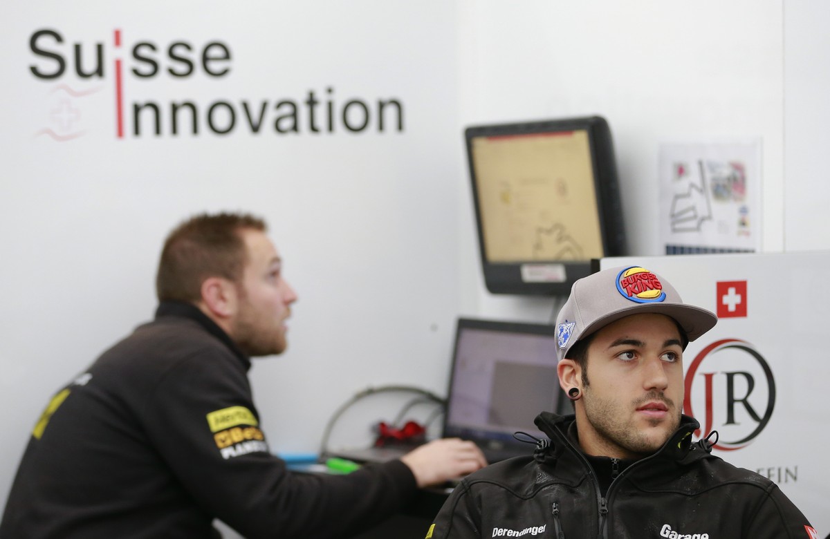 Moto2 rider Jesko Raffin of Switzerland looks at a monitor during the free practice session for the MotoGP Japanese Motorcycle Grand Prix at the Twin Ring Motegi circuit in Motegi, north of Tokyo, Fri ...