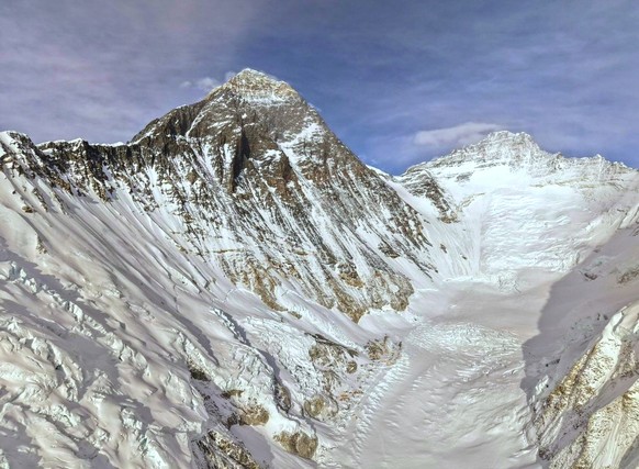 Mount Everest is seen, center left, from base camp in Nepal, Sunday, May 10, 2026. (AP Photo/Pasang Rinzee Sherpa)
Nepal Everest Photo Gallery