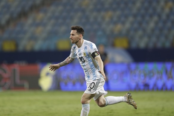 Argentina's Lionel Messi celebrates scoring his side's third goal against Ecuador during a Copa America quarterfinal soccer match at the Olimpico stadium in Goiania, Brazil, Saturday, July 3 ...