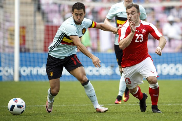 Belgian Eden Hazard, left, fights for the ball with Swiss forward Xherdan Shaqiri, right, during an international friendly test match between the national soccer teams Switzerland and Belgium, at the  ...