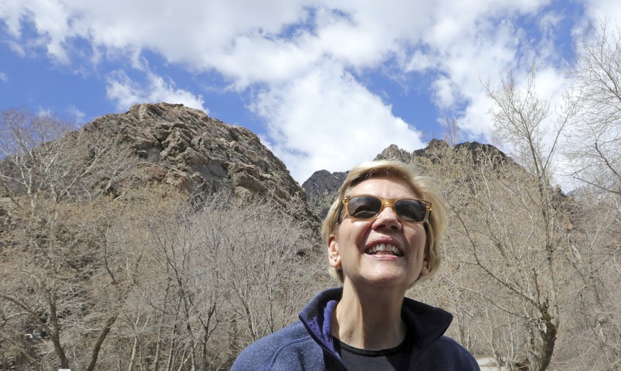 Democratic presidential candidate Sen. Elizabeth Warren, D-Mass., visits Big Cottonwood Canyon Wednesday, April 17, 2019, east of Salt Lake City. Warren is in Utah Wednesday after promising to restore ...