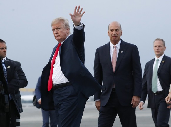 FILE - In this Tuesday, July 10, 2018, file photo, President Donald Trump is joined by Gordon Sondland, the U.S. ambassador to the European Union, second from right, as he arrives at Melsbroek Air Bas ...