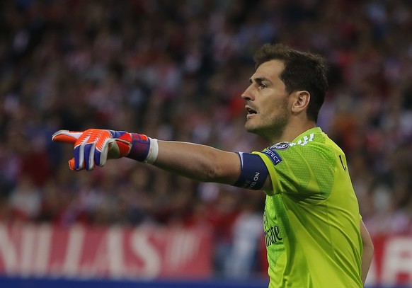 Real Madrid&#039;s goalkeeper Iker Casillas reacts during the Champions League quarterfinal first leg soccer match between Atletico Madrid and Real Madrid at the Vicente Calderon stadium in Madrid, Sp ...