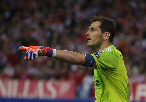 Real Madrid&#039;s goalkeeper Iker Casillas reacts during the Champions League quarterfinal first leg soccer match between Atletico Madrid and Real Madrid at the Vicente Calderon stadium in Madrid, Sp ...