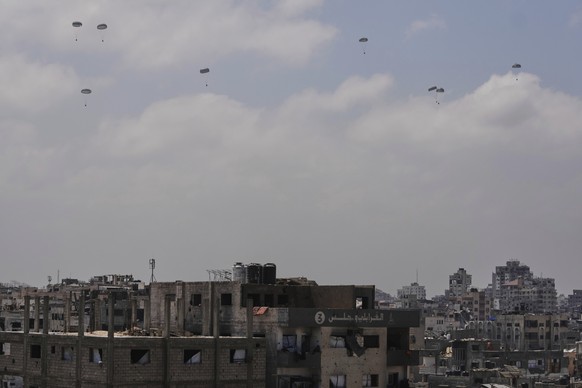 Humanitarian aid is airdropped to Palestinians over Gaza City, northern Gaza Strip, Friday, Aug. 8, 2025. (AP Photo/Jehad Alshrafi)
Israel Palestinians Gaza
