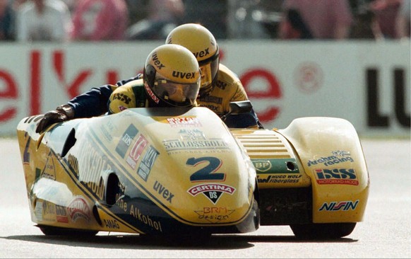 Swiss Rolf Biland and Kurt Waltisperg in action during the sidecar event of the Dutch Motorcycling Grand Prix in Assen 28 June 1997. The Swiss team withdrew after seven laps due to engine problems. (A ...