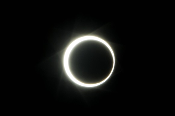 191226 -- BATAM, December.  December 26, 2019 -- An annular solar eclipse is seen on Engku Putri Island in Batam, Indonesia, December.  26, 2019. Photo by /Xinhua INDONESIA-BATAM-ANNULAR SOLAR ECLIPSE TeguhxPriatna PUBLIC...